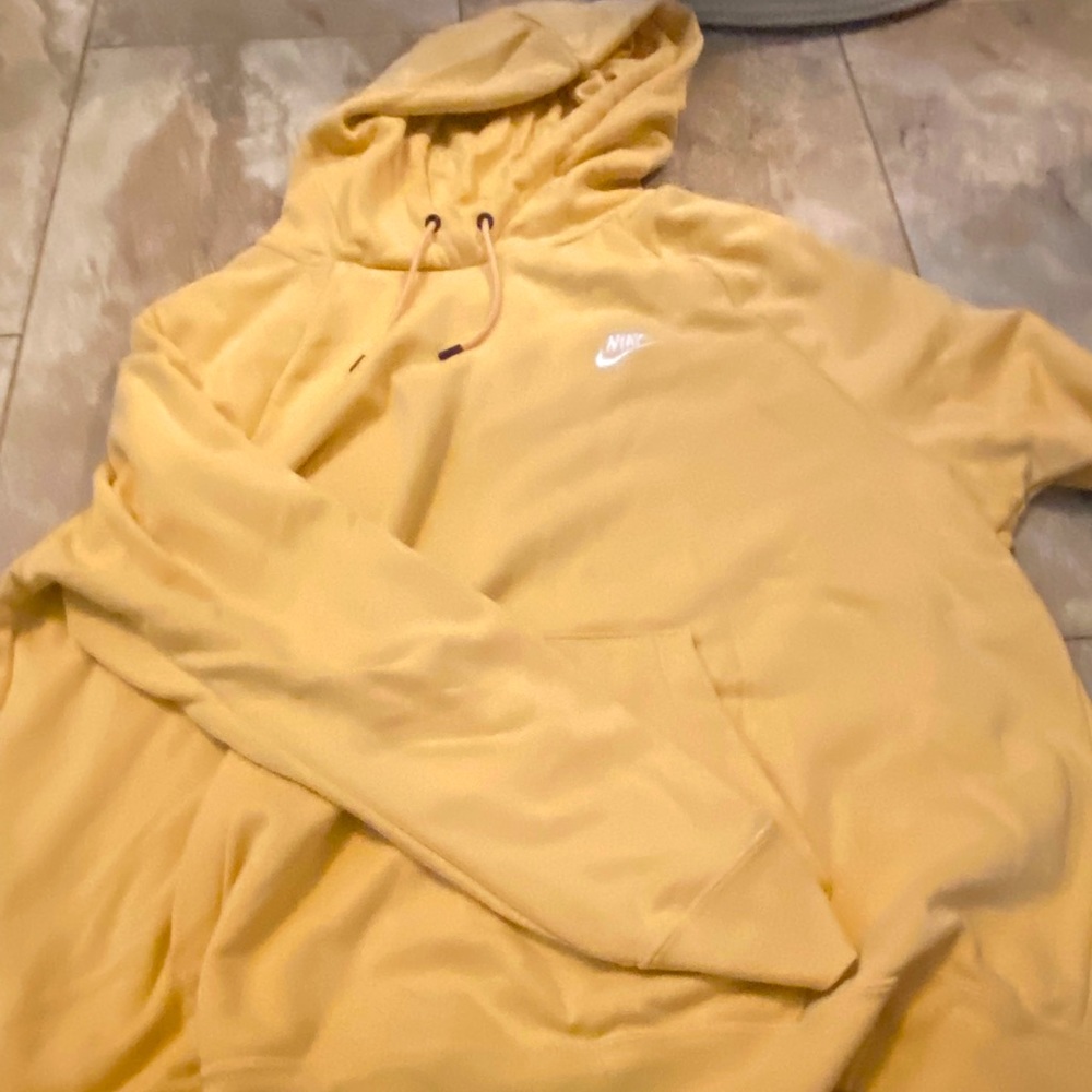 Orange Nike sweatshirt